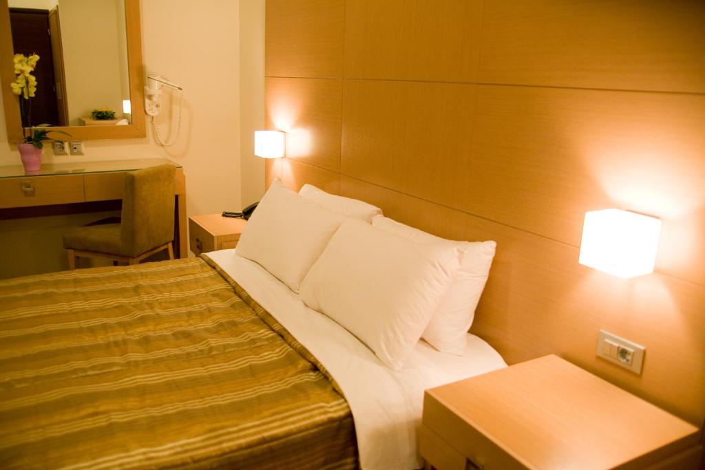 Cama o camas de una habitación en Onira Boutique