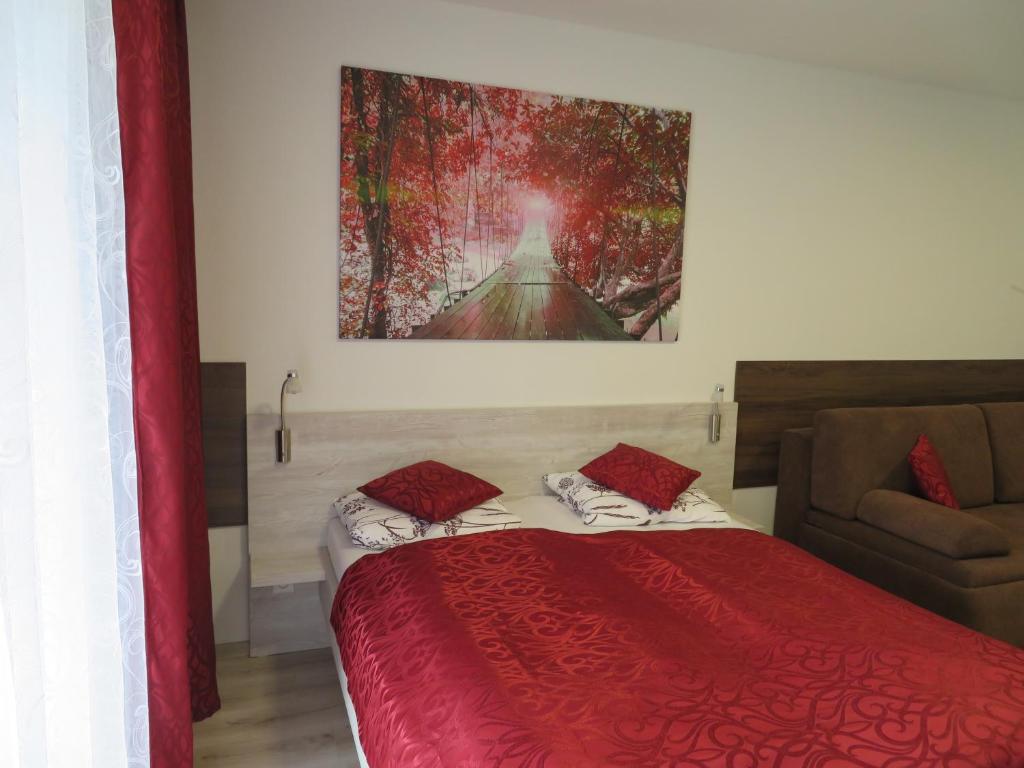 Posteľ alebo postele v izbe v ubytovaní Apartmán Bohemia