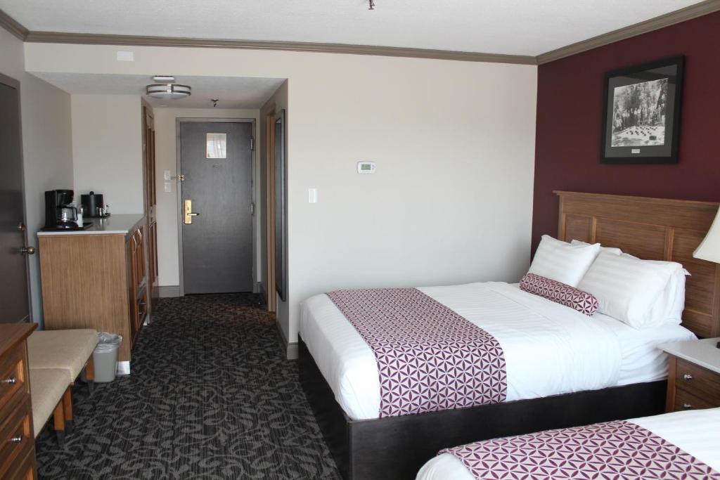 Postel nebo postele na pokoji v ubytování The Royal Anne Hotel