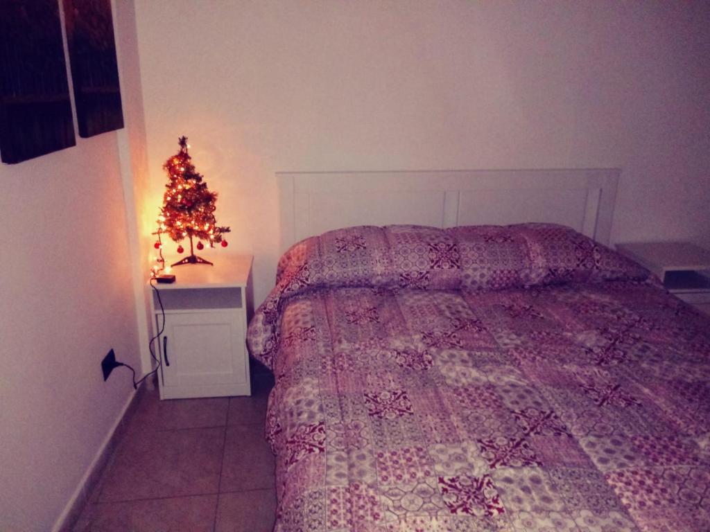 Posteľ alebo postele v izbe v ubytovaní Casamassimi apartment