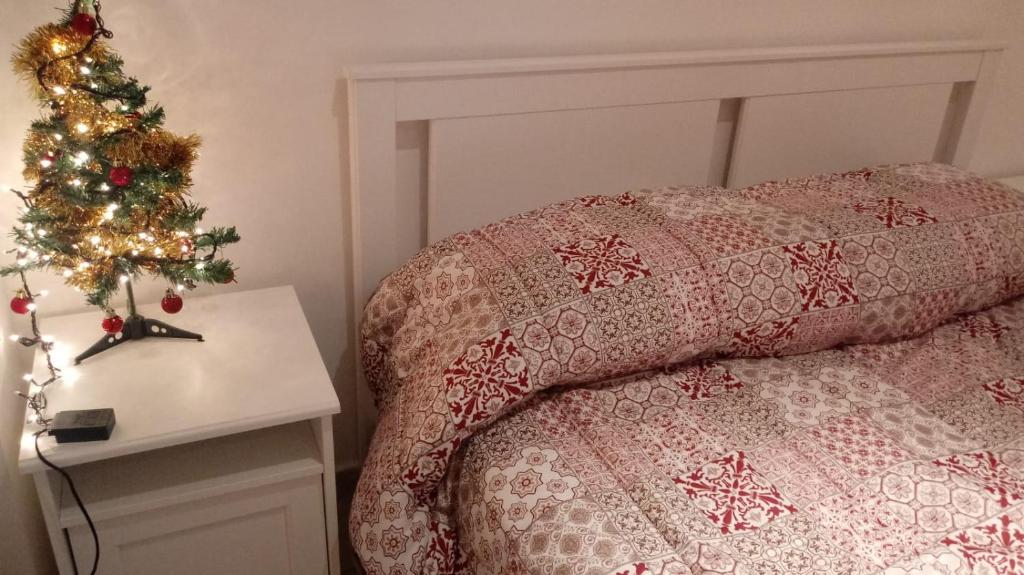 Posteľ alebo postele v izbe v ubytovaní Casamassimi apartment