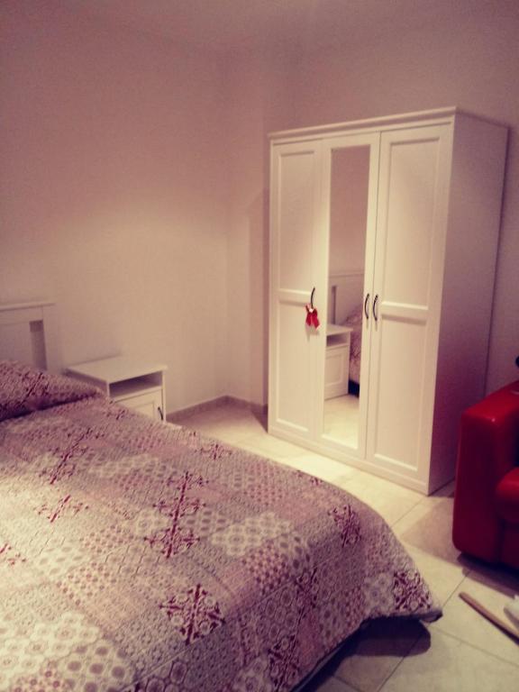 Posteľ alebo postele v izbe v ubytovaní Casamassimi apartment