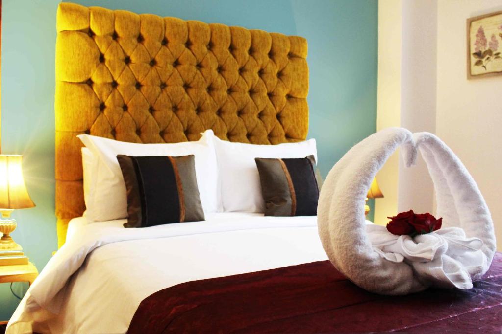 Postel nebo postele na pokoji v ubytování Casa Joaquin Boutique Hotel