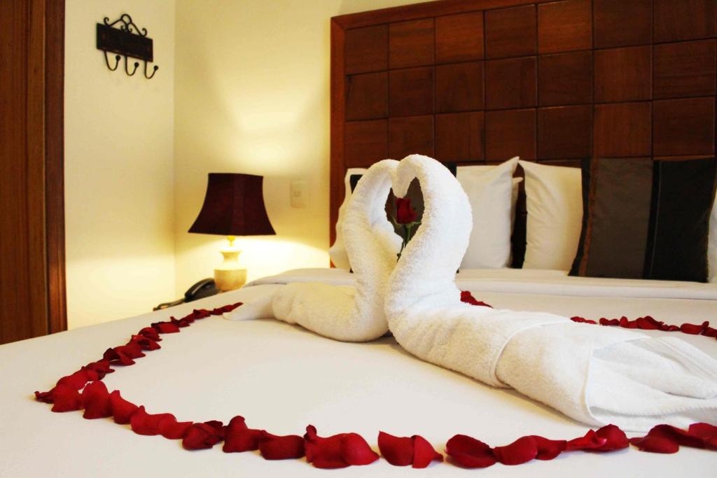 Postel nebo postele na pokoji v ubytování Casa Joaquin Boutique Hotel