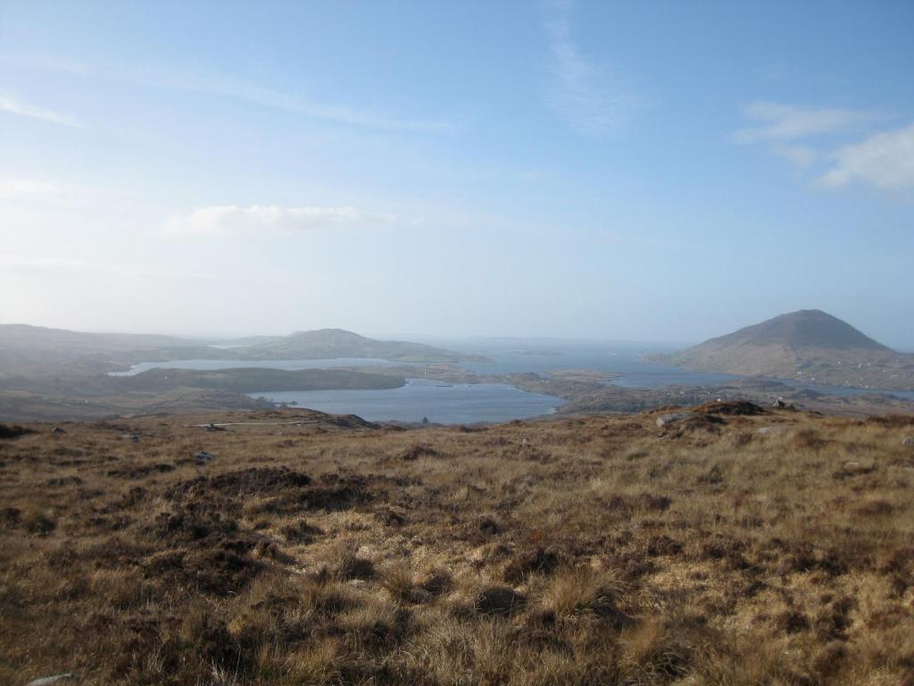 a view of a lake from the top of a hill at Ben Breen House B&B in Clifden