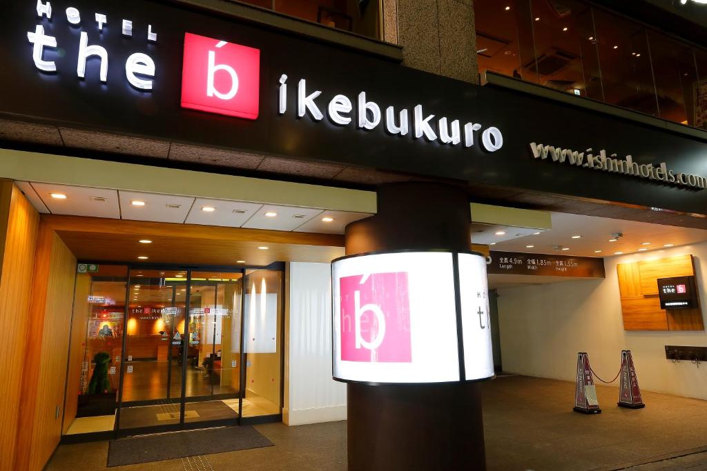 a sign in front of a shopping mall at the b ikebukuro in Tokyo
