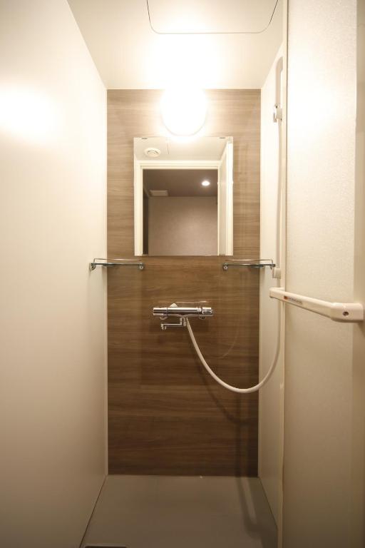 Koupelna v ubytování Dormy Inn Premium Osaka Kitahama