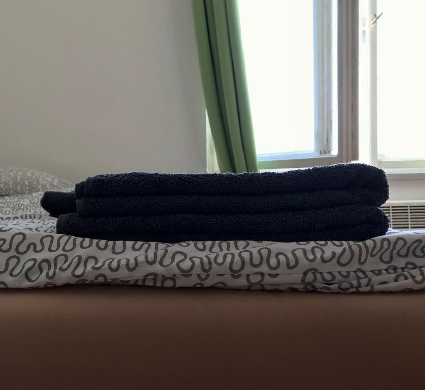 Postel nebo postele na pokoji v ubytování Cosy Flora Nest
