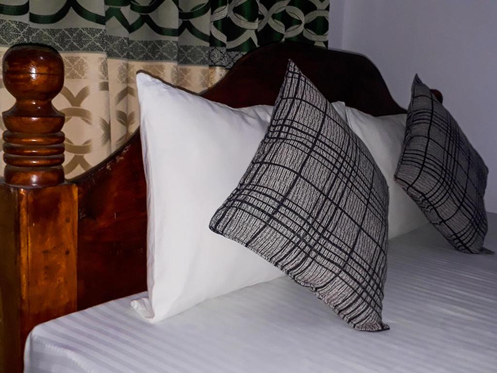 Postel nebo postele na pokoji v ubytování Danara Homestay