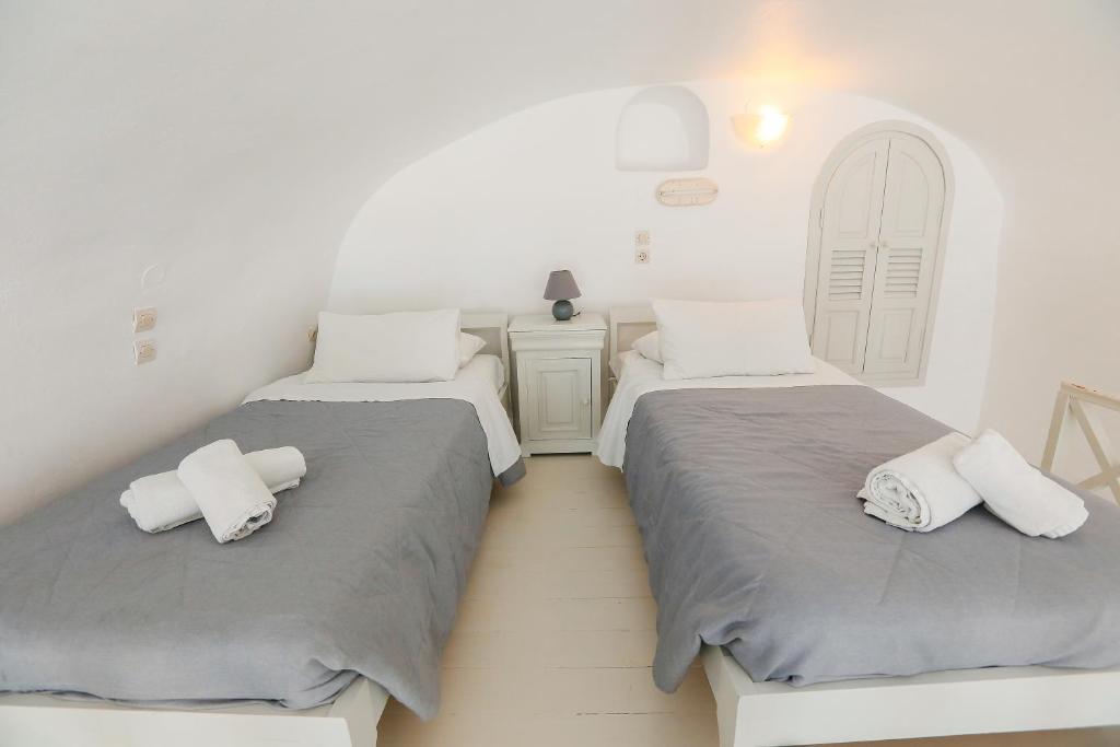 Cama o camas de una habitación en Ilioperato Hotel