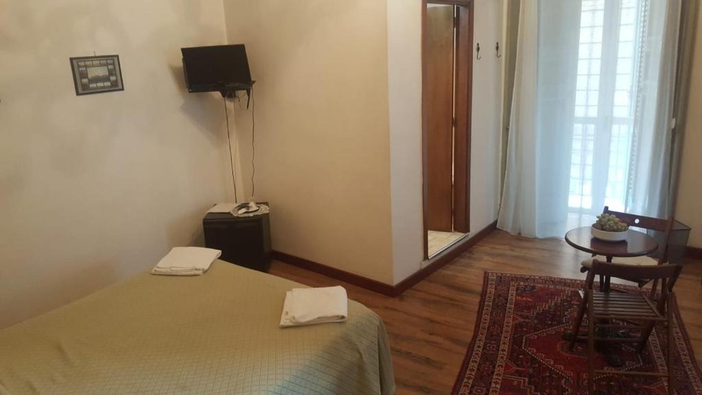 Posteľ alebo postele v izbe v ubytovaní B&B Miseria e Nobilta'