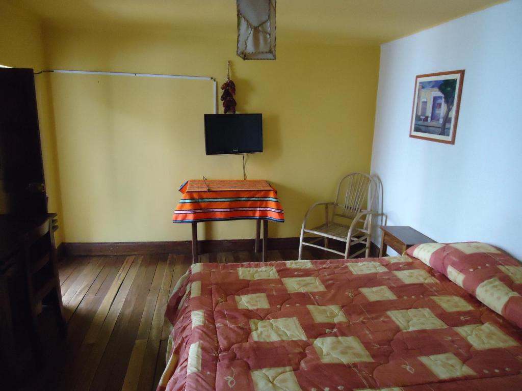 Letto o letti in una camera di Posada Junco y Capuli