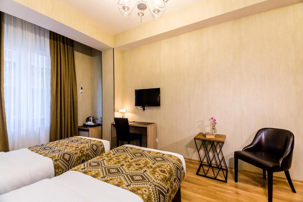 Postel nebo postele na pokoji v ubytování Hotel Diamond