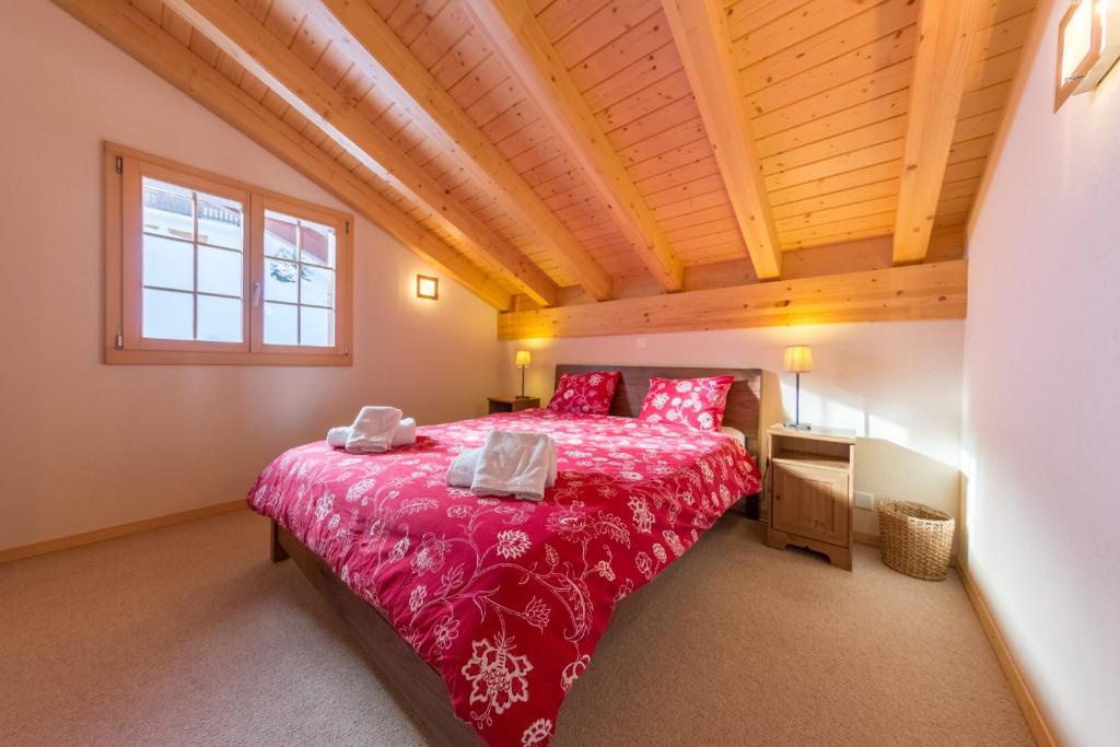 Postel nebo postele na pokoji v ubytování Chalet Nid Blanc
