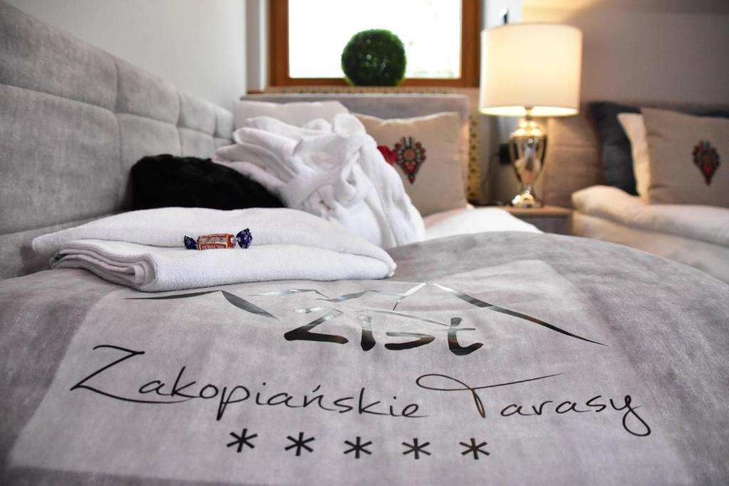 Posteľ alebo postele v izbe v ubytovaní Zakopane Zist Spa Zakopianskie Tarasy