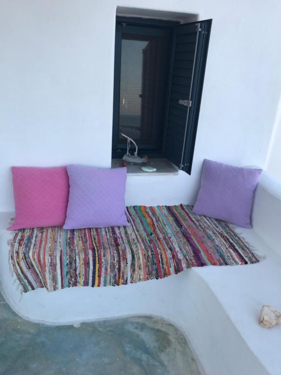 Postel nebo postele na pokoji v ubytování Vegera Beach House, Donoussa