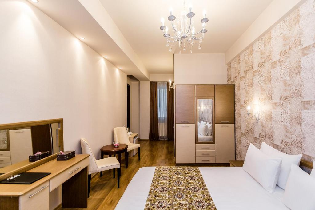 Postel nebo postele na pokoji v ubytování Hotel Diamond