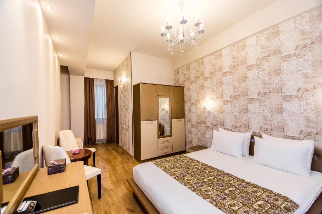 Postel nebo postele na pokoji v ubytování Hotel Diamond