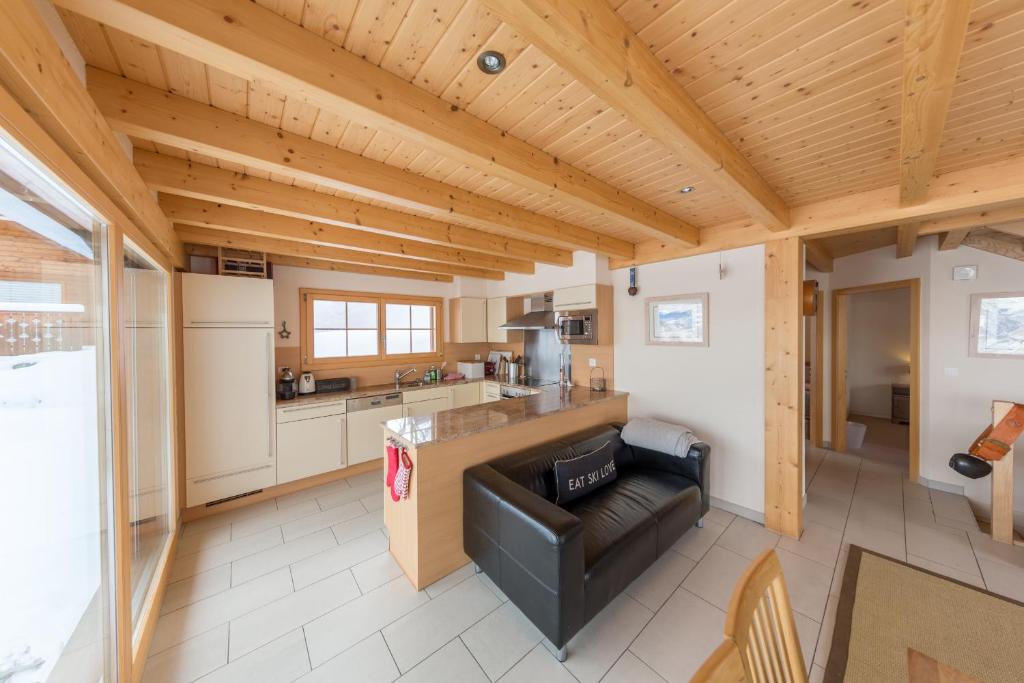 Kuchyň nebo kuchyňský kout v ubytování Chalet Nid Blanc
