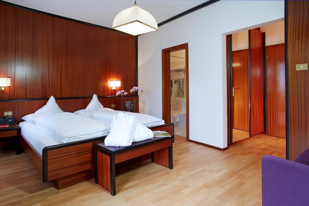 Postel nebo postele na pokoji v ubytování Hotel Juliane