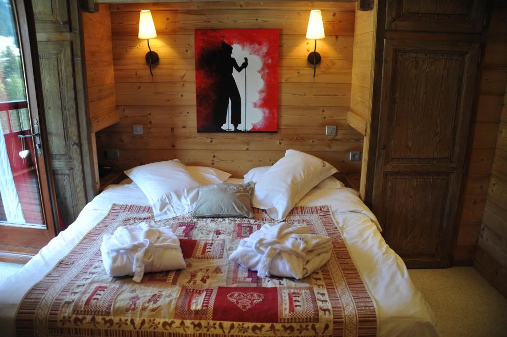 Postel nebo postele na pokoji v ubytování Hôtel Chalet Alpage