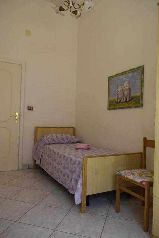 Postel nebo postele na pokoji v ubytování A Due Passi Dal Mare