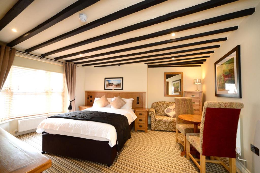 Llit o llits en una habitació de The Star Inn 1744
