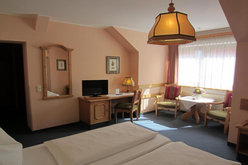 TV a/nebo společenská místnost v ubytování Hotel Plainbrücke | self check-in