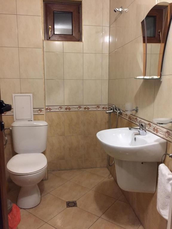Koupelna v ubytování Guest Rooms Vachin