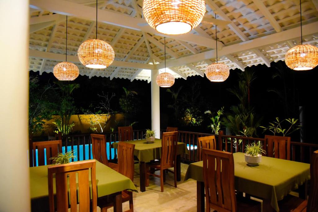 Restaurace v ubytování Odailem Resort - Talpe
