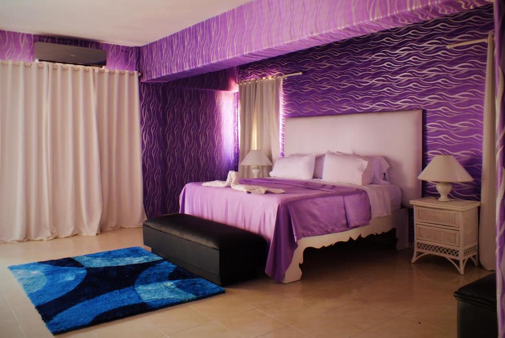 Postel nebo postele na pokoji v ubytování Hotel Maracas Punta Cana