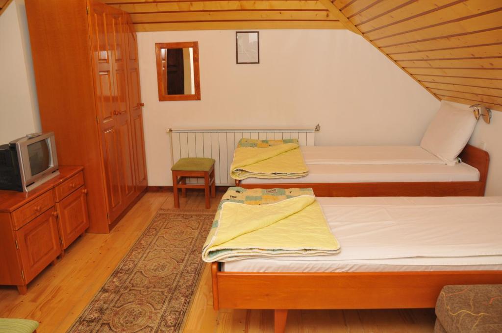 Postel nebo postele na pokoji v ubytování Vila Jelena Zlatar Nova varoš