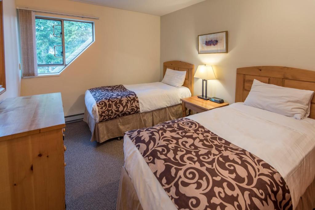 Postel nebo postele na pokoji v ubytování Valhalla Vacations at Whistler