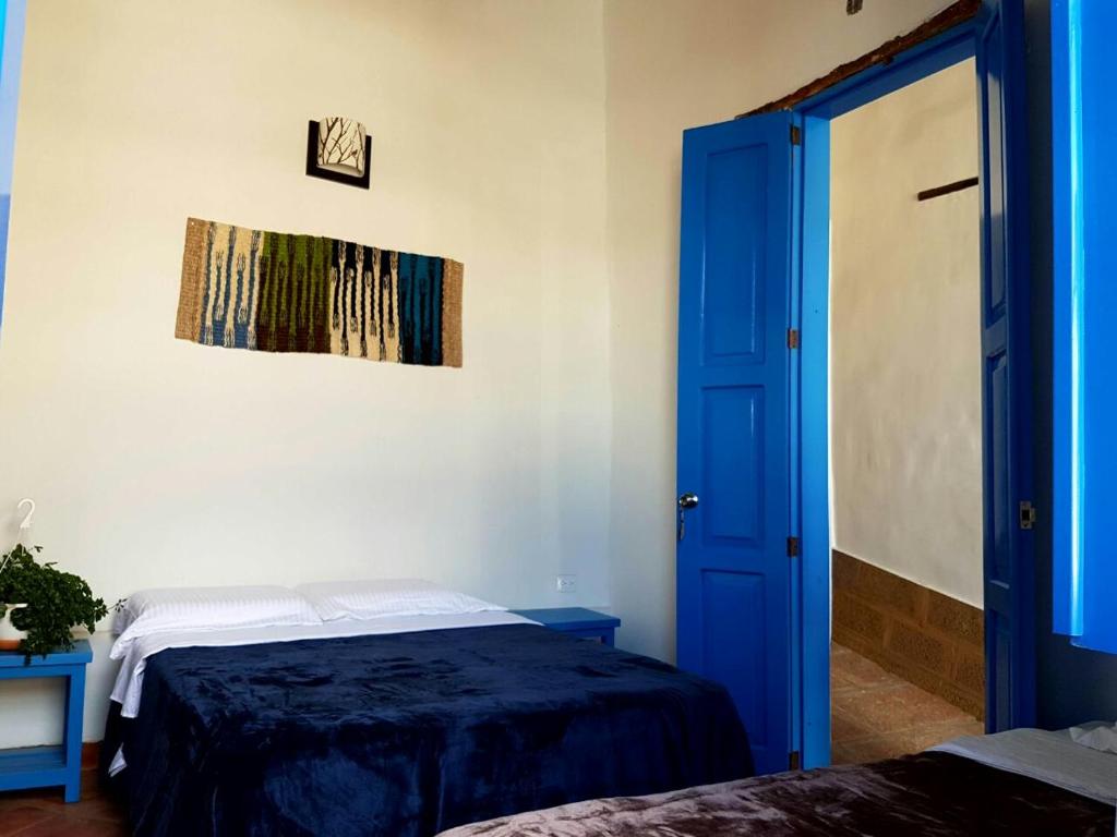 Postel nebo postele na pokoji v ubytování Meraki Boutique Hostel