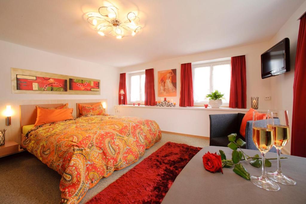 Postel nebo postele na pokoji v ubytování Hotel Landgasthof Hirschen