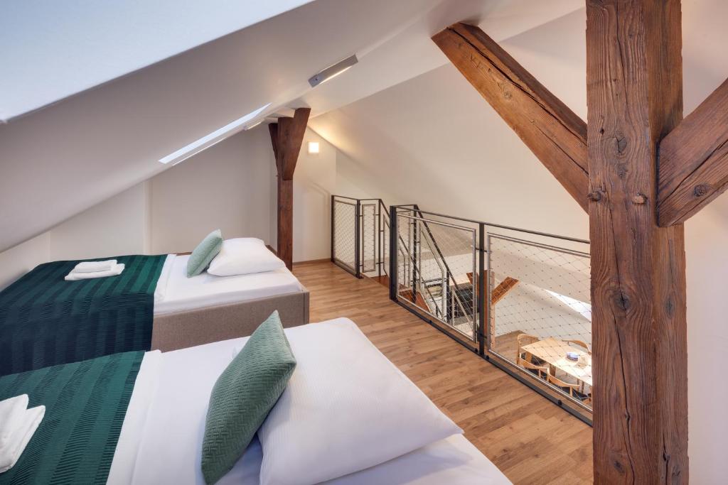 Postel nebo postele na pokoji v ubytování Louren Apartments