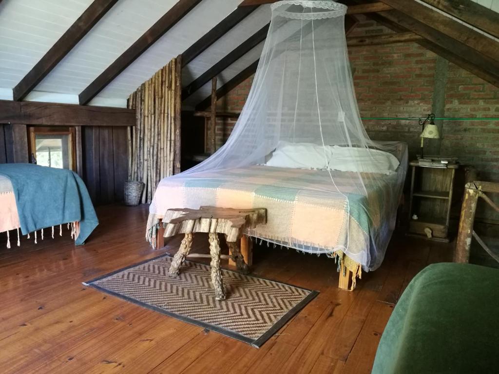 Postel nebo postele na pokoji v ubytování Tacuapí Lodge