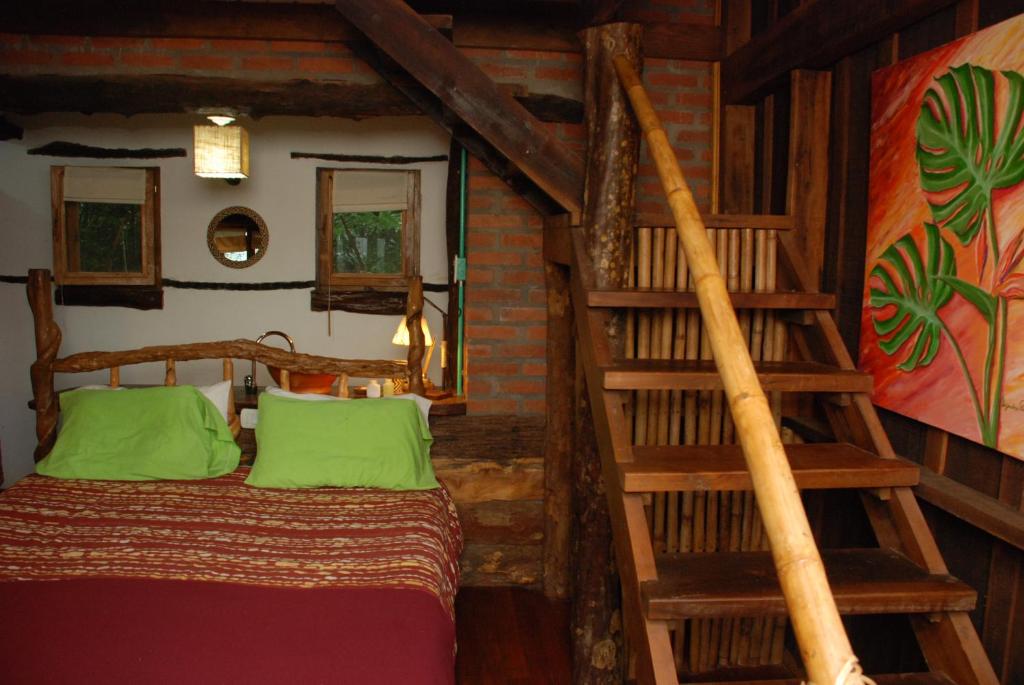 Postel nebo postele na pokoji v ubytování Tacuapí Lodge