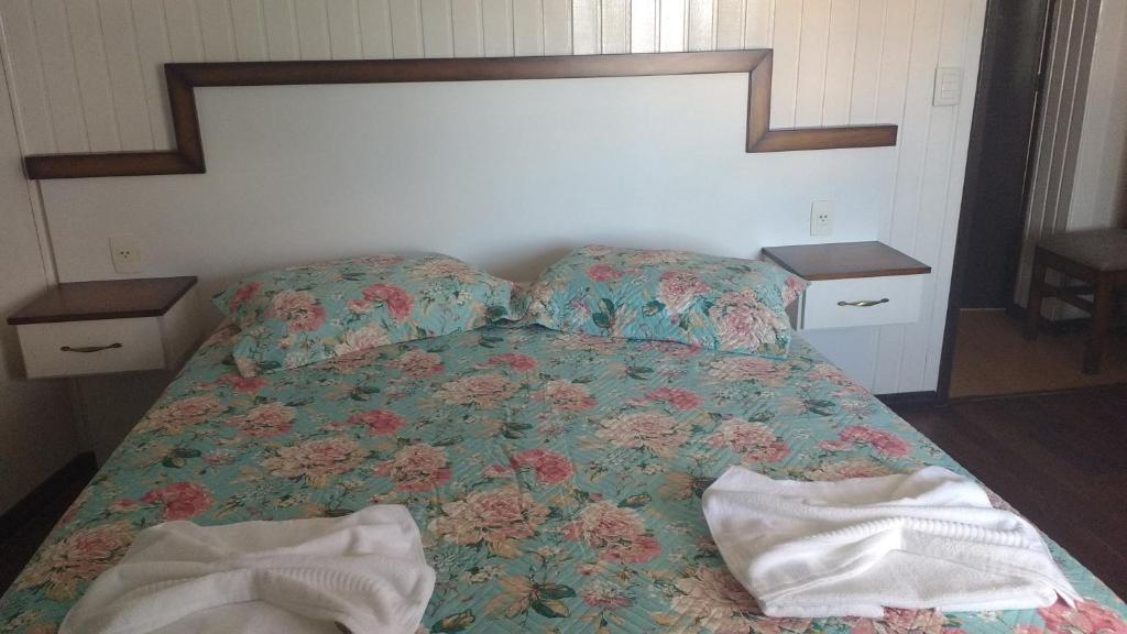Cama o camas de una habitación en Apartamento a 700m da Borges de Medeiros!
