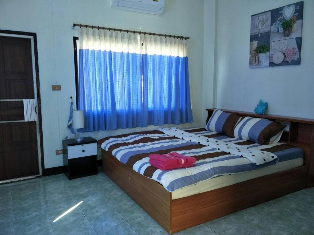 Postel nebo postele na pokoji v ubytování Nara House