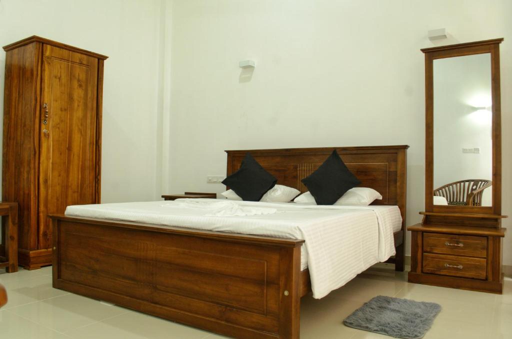 Postel nebo postele na pokoji v ubytování Single Fin Weligama