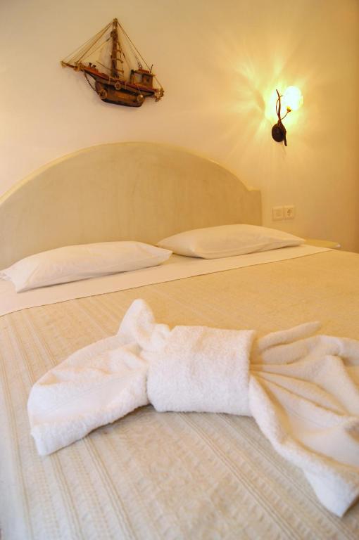 Postel nebo postele na pokoji v ubytování Veletas Rooms