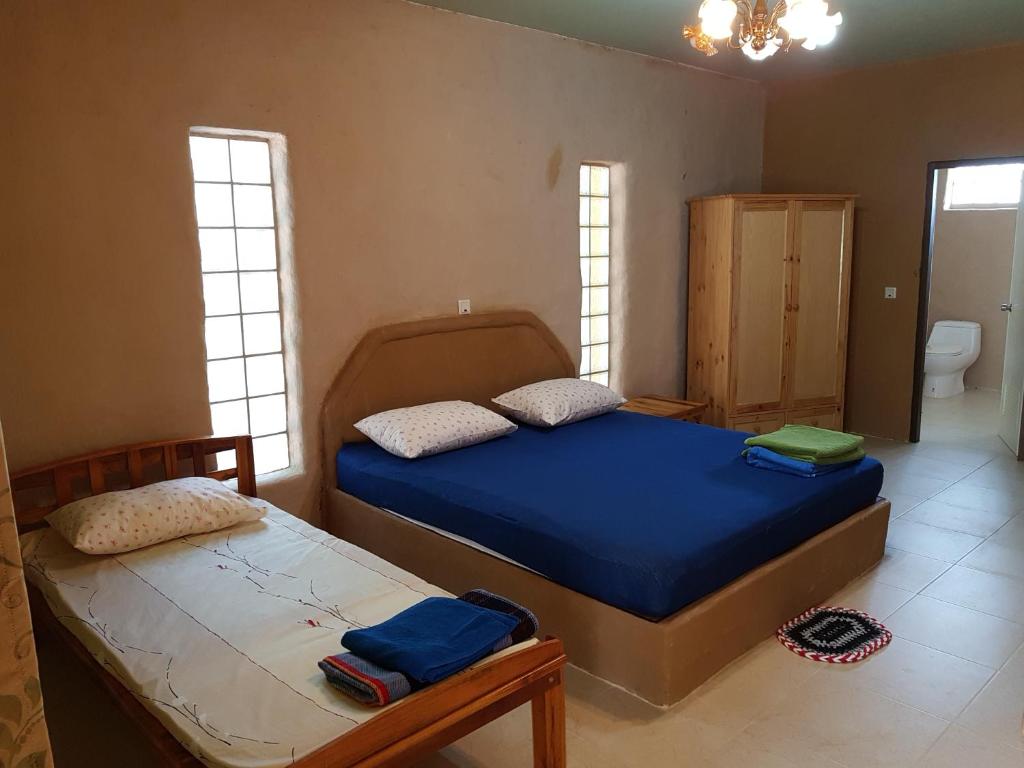 Ліжко або ліжка в номері Baandin resort