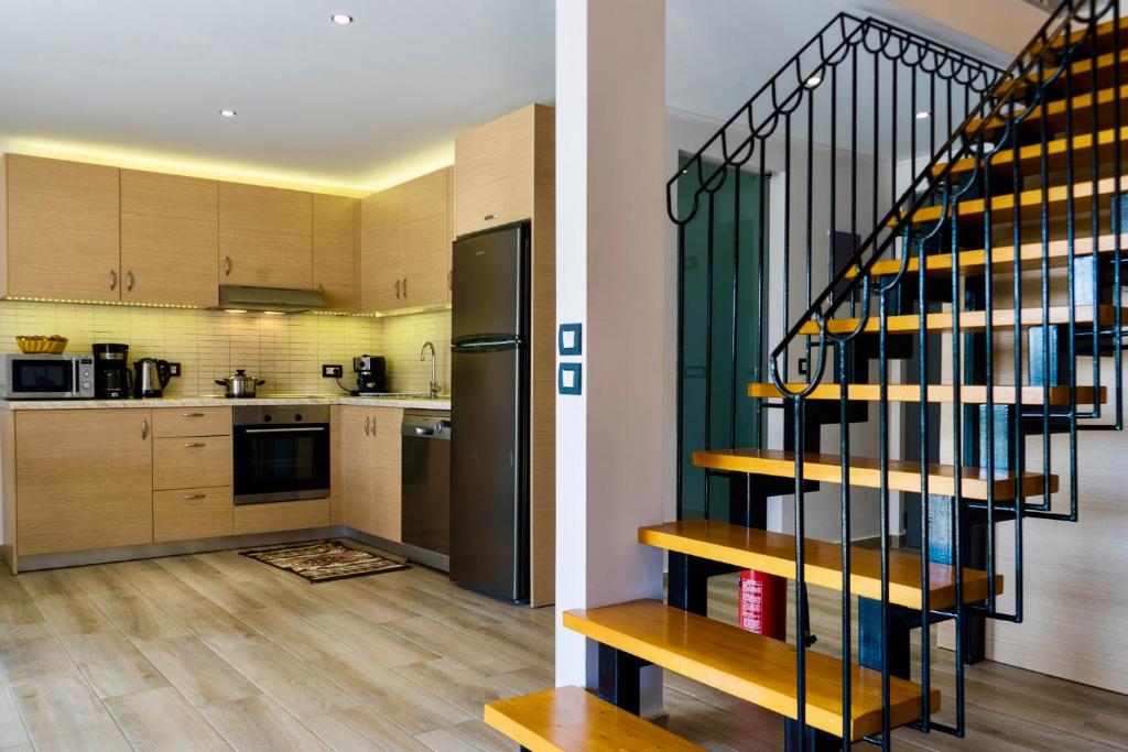A kitchen or kitchenette at Estrella Villas