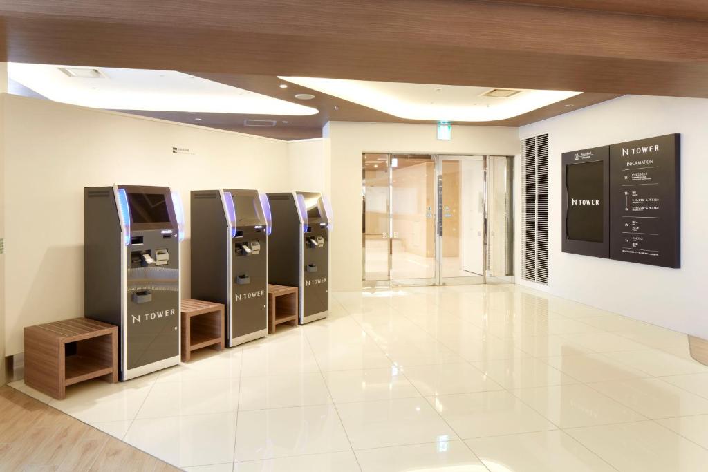 a row of parking meters in a building at Shinagawa Prince Hotel N Tower in Tokyo