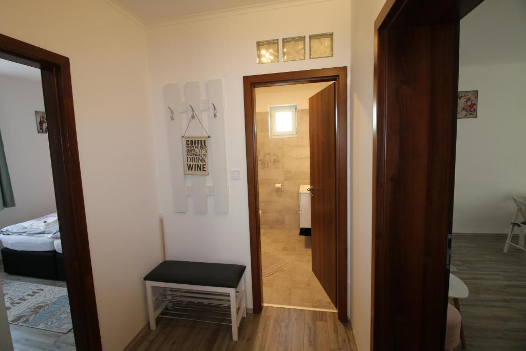 Posteľ alebo postele v izbe v ubytovaní Szent Iván Apartman
