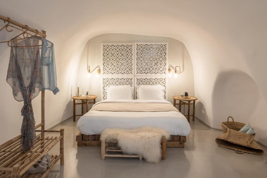 Postel nebo postele na pokoji v ubytování Cocoon Suites