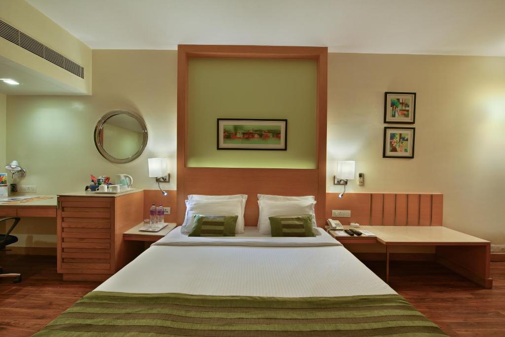 Cama ou camas em um quarto em Hotel Heritage formerly known as Comfort Inn Heritage