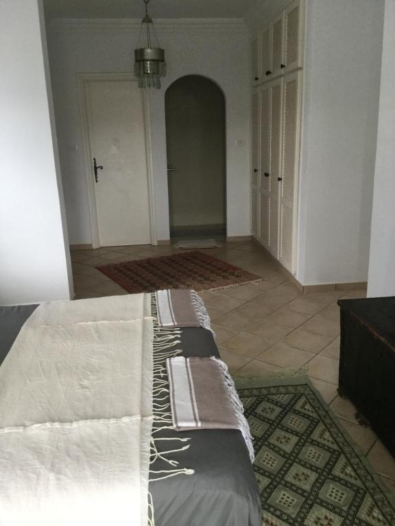 Postel nebo postele na pokoji v ubytování Midounia