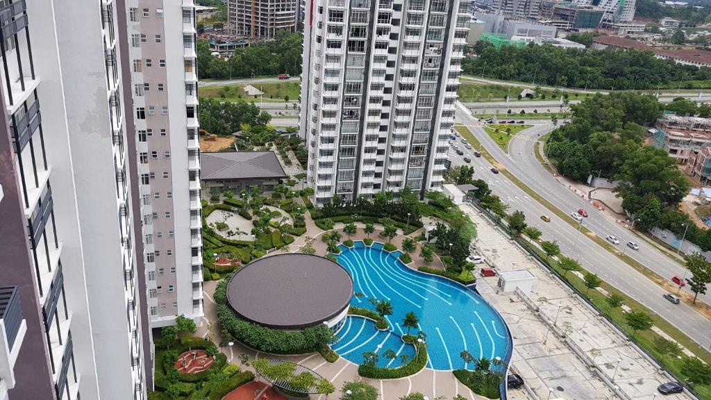an aerial view of a swimming pool in a city at Alyssa Homestay Putrajaya 3R 3B in Putrajaya